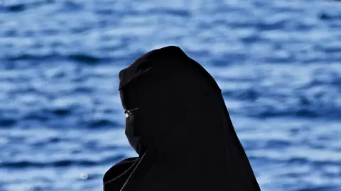 Una mujer con burka.