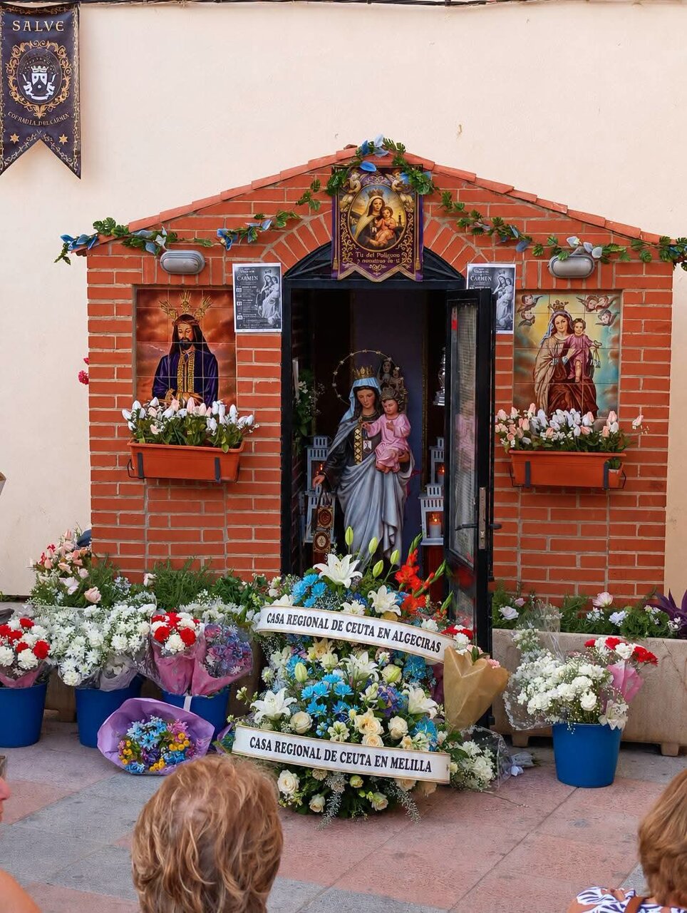 Ofrenda a la Virgen del Carmen en el Polígono